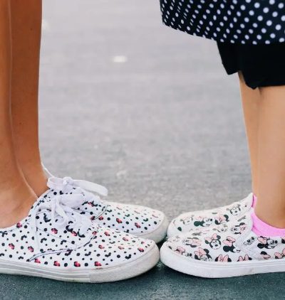 Mom and daughter in matching Disney shoes